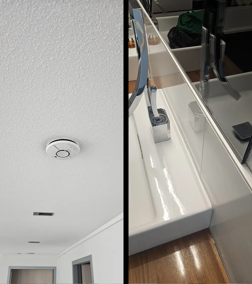 Nieuwe rookmelder aan het plafond en wasbak met een nette transparante kitrand