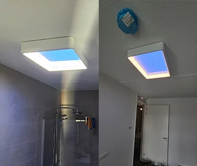 Twee Philips Skylight-daglichtlampen netjes aan het plafond geïnstalleerd